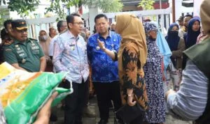 IMG_COM_202402232248103170 Kenaikan Harga Beras