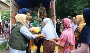 IMG_COM_202402232254367120 Pendistribusian Beras Murah