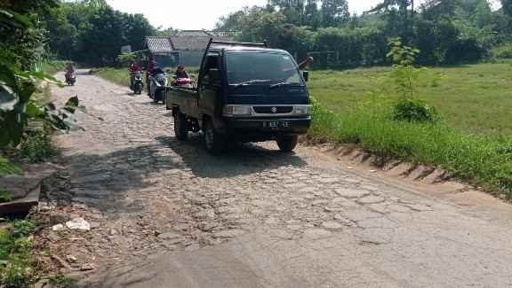 IMG_COM_202405131401430520 Jalan Adam Satu Desa Ciledug